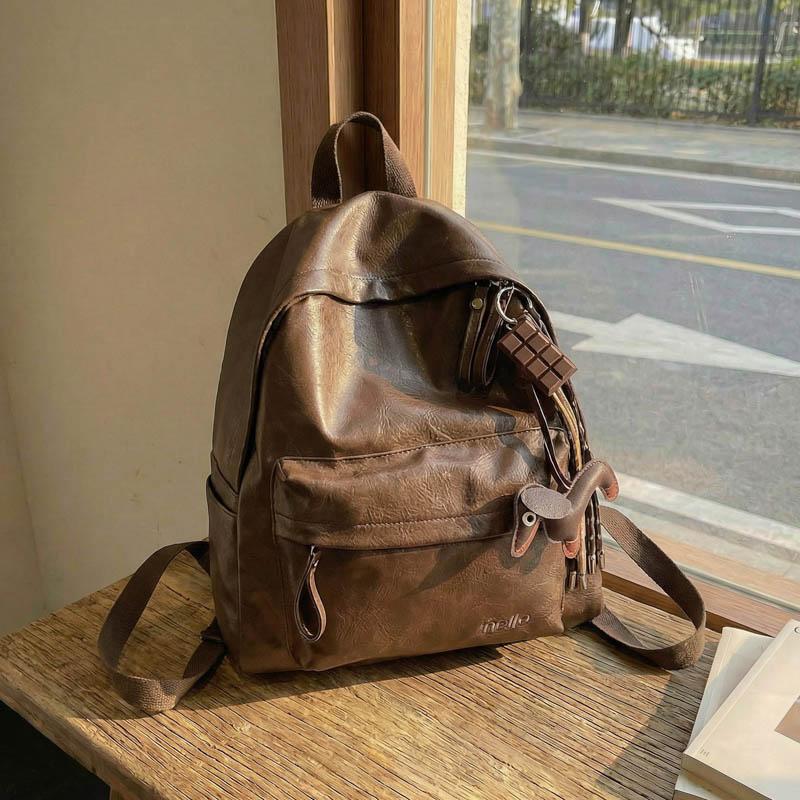 Fashionable PU Leather Backpack with Adjustable Shoulder Straps Simple Design Suitable for Daily Use Travel Shopping and Other Scenarios No Pendant