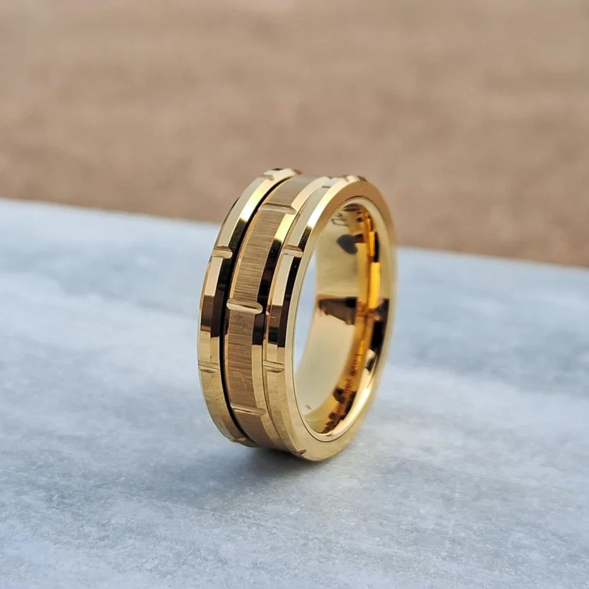 This 8mm Gold Tungsten Ring features a unique mechanical seal inlay, combining durability and style for the modern man Free Custom Engraving